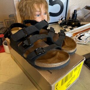 Birkenstock Black Sandals with Adjustable Straps and Cork Footbed